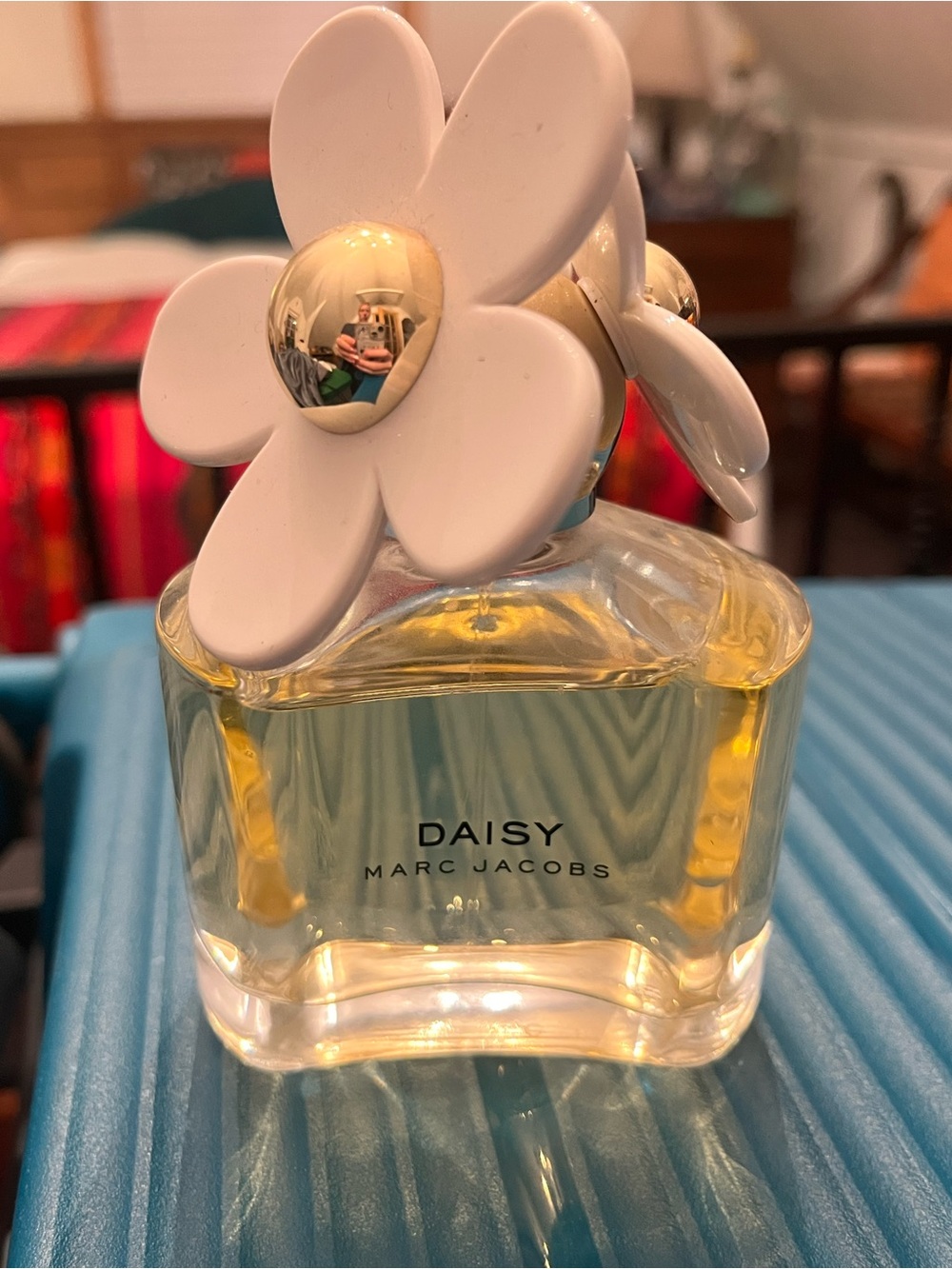 Marc Jacobs Daisy Perfume Bottle with White Floral Cap and Gold Accents